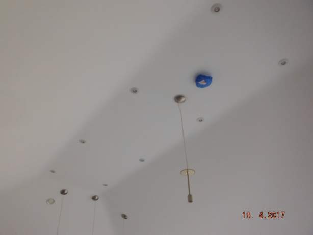 several downlighters in ceiling - good airtight finish nonetheless